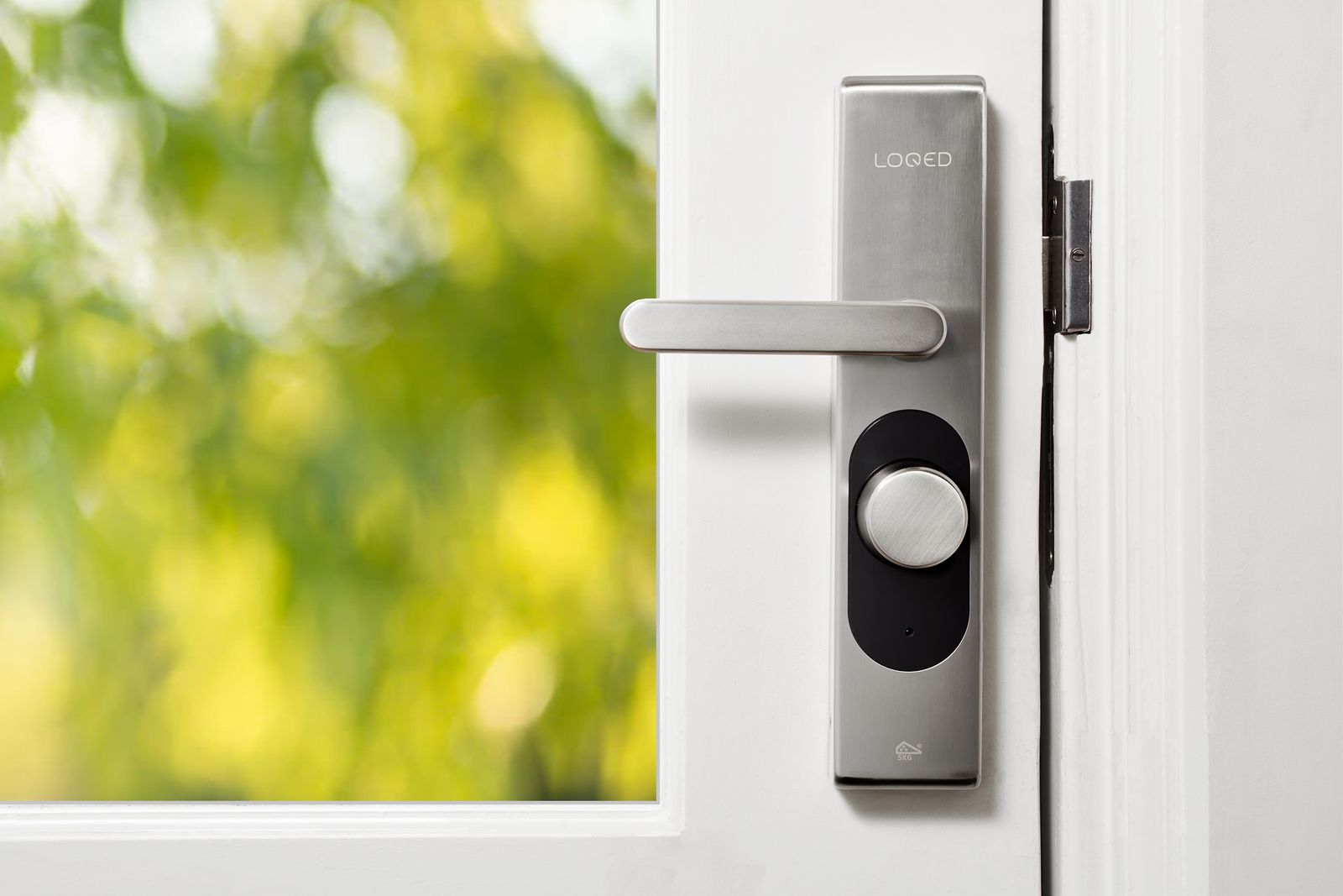 Modern smart lock fitted to a residential front door